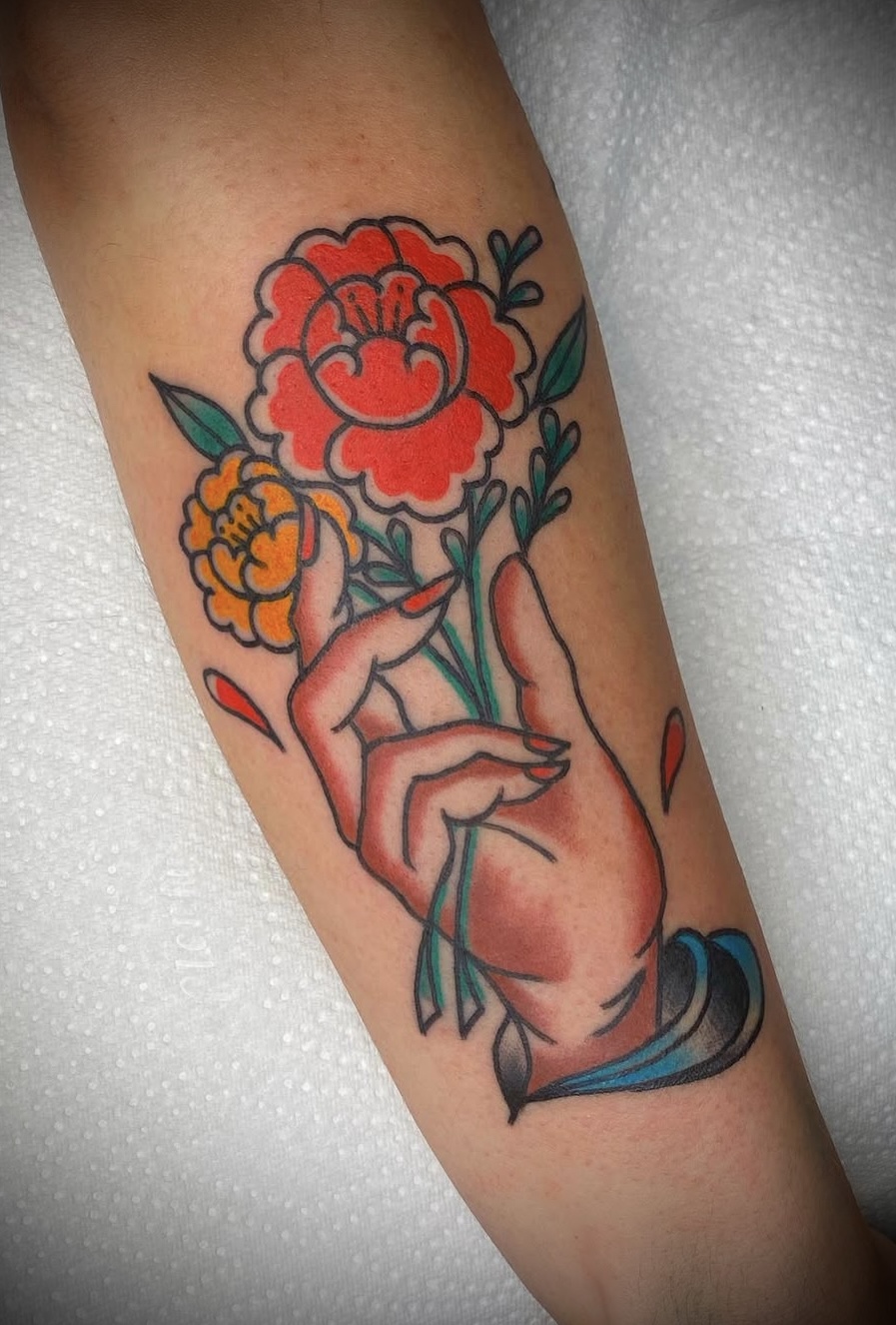 Traditional flowers tattoo in Bilbao
